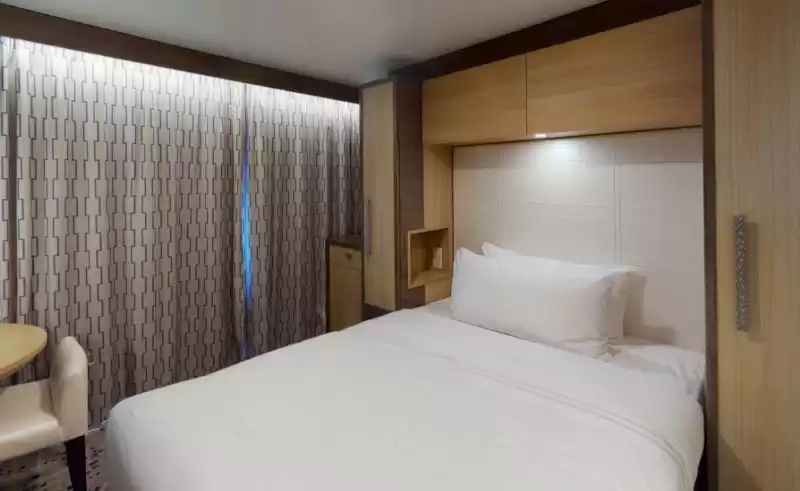 Cabina estudio con vista al mar y balcón
